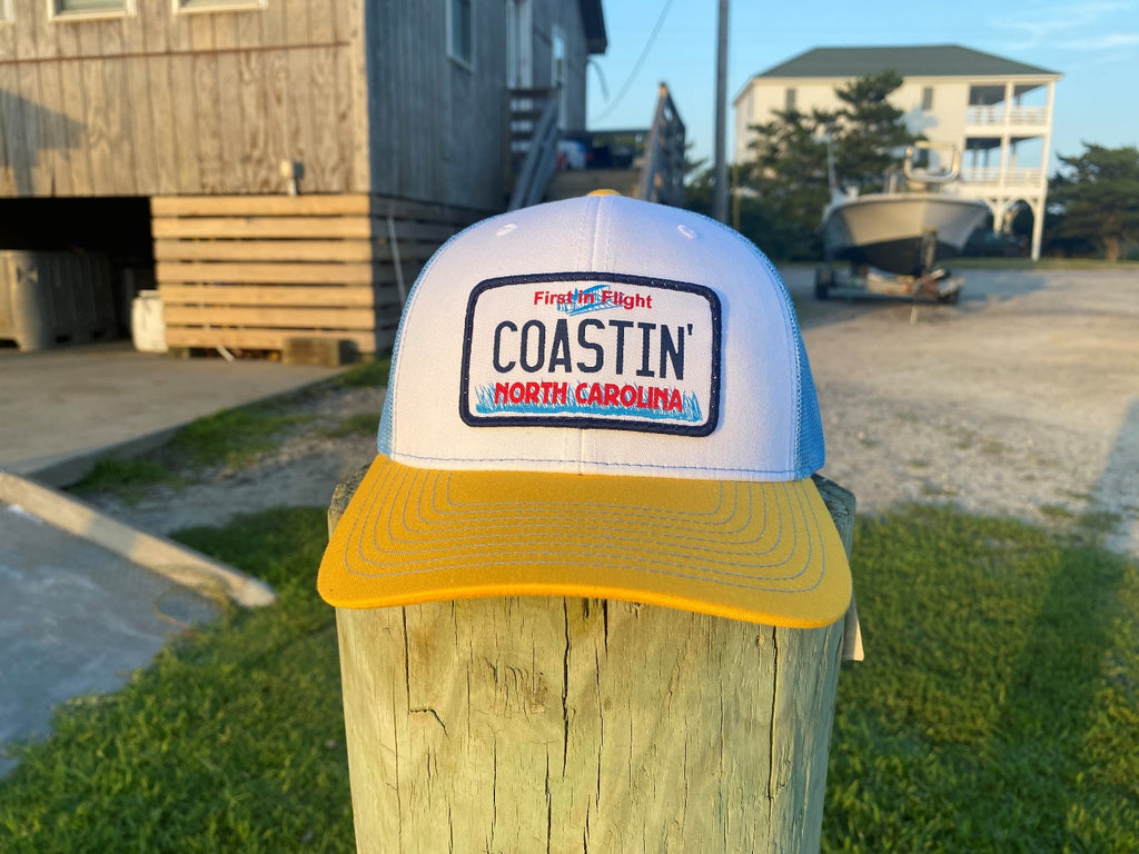 Coastin' North Carolina License Plate Trucker Hat
