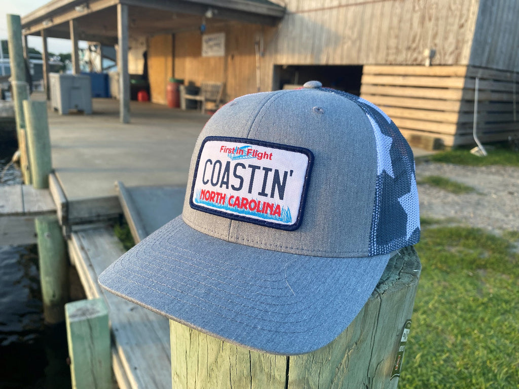 Coastin' North Carolina License Plate Trucker Hat